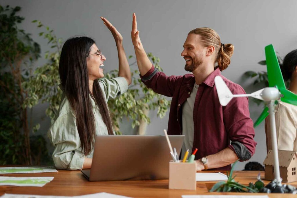 High Five zwischen einem Mann und einer Frau